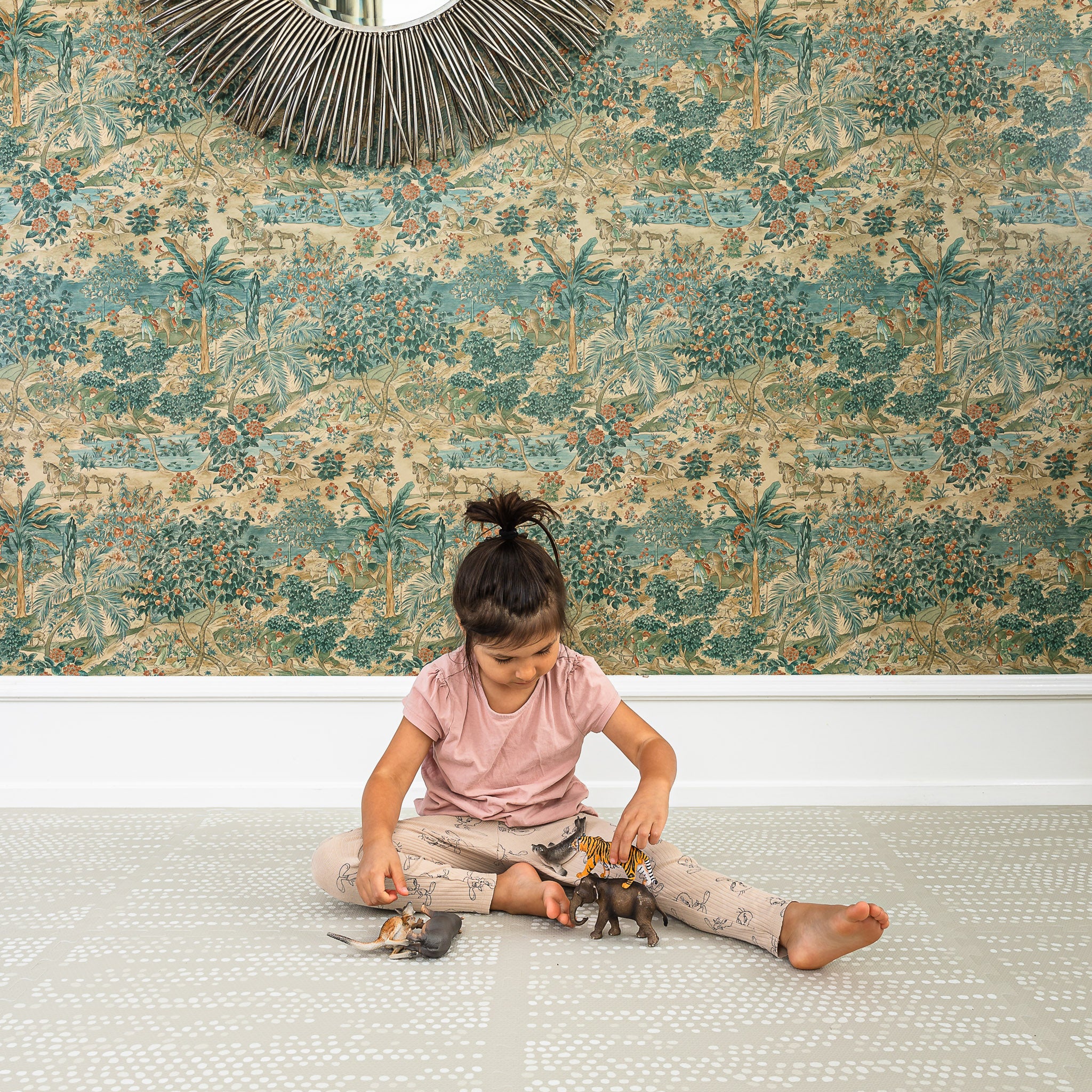 Dots Stone non-toxic baby play mat in minimalist living room setting