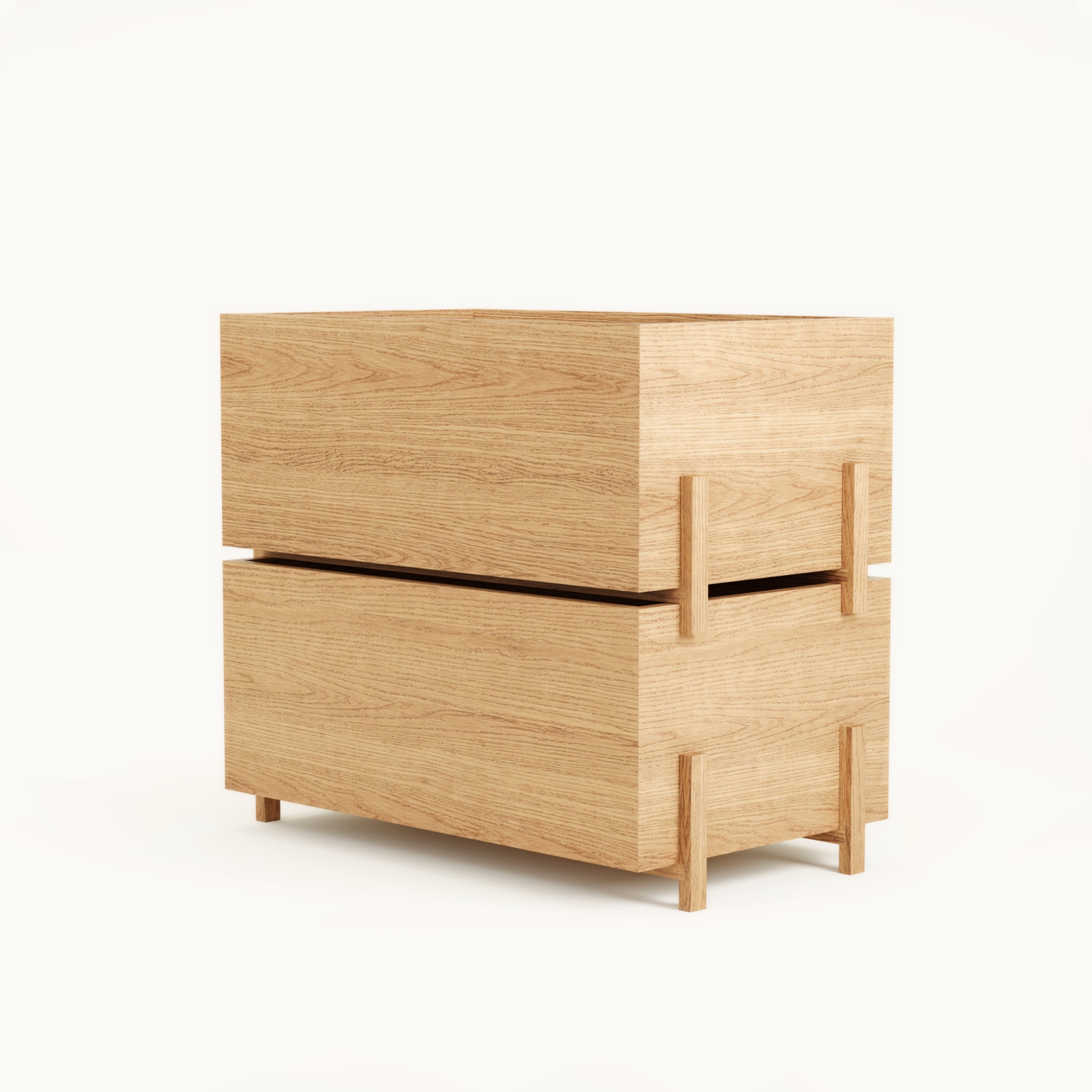 Angled view of Kassen Stack 2 closed modular wooden storage unit in solid oak with concealed compartments and minimalist design